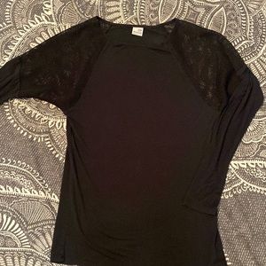 Champion brand black, long sleeve tea with mesh, shoulders, size extra small